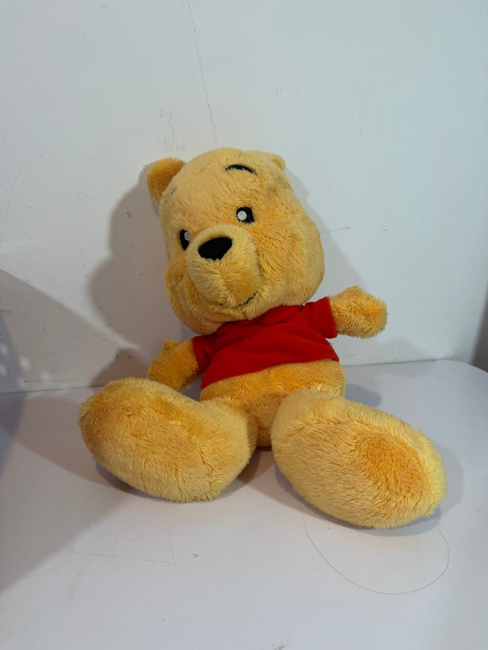 Disney Parks Winnie the Pooh Big Feet Plush Stuffed Animal 12"